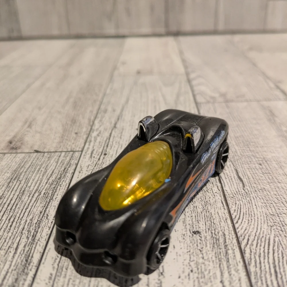 Hot Wheels Black Convertible Toy Car with Yellow Canopy